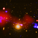 A composite image of a black hole that is triggering star formation across the longest distance ever seen.